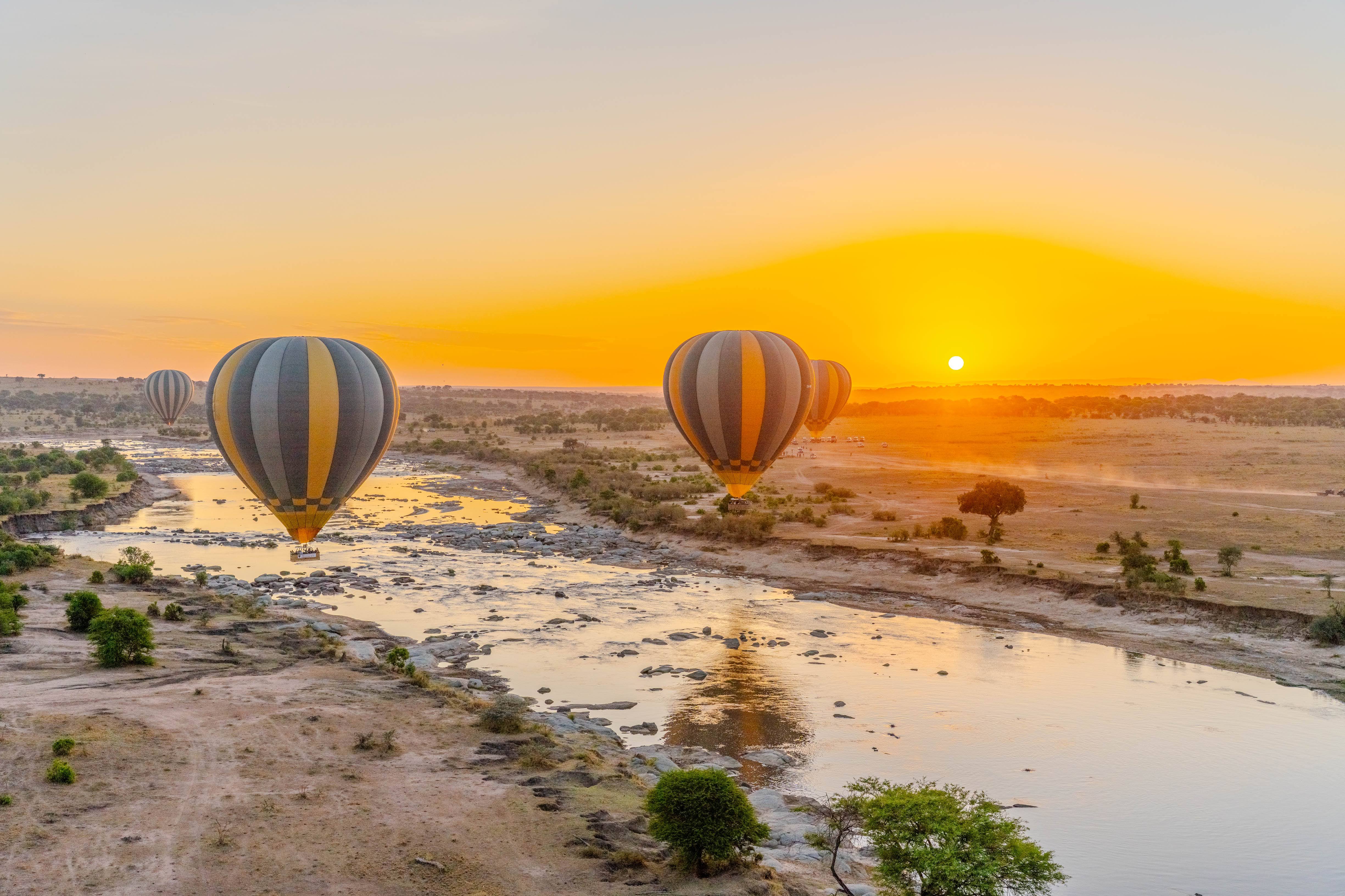 Sunrise over the Mara River in a hot air balloon