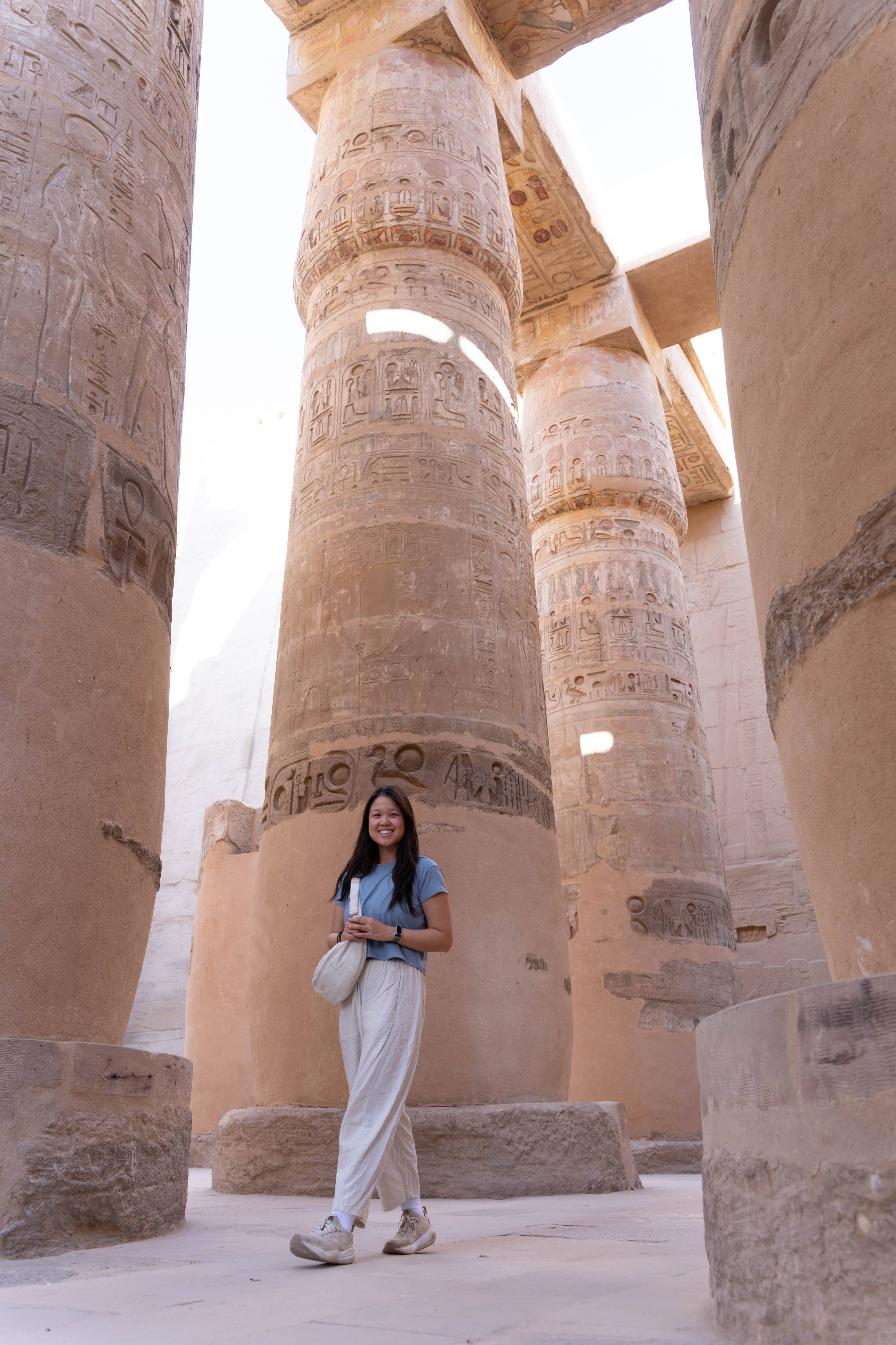 Kim in front of the columns of Karnak temple